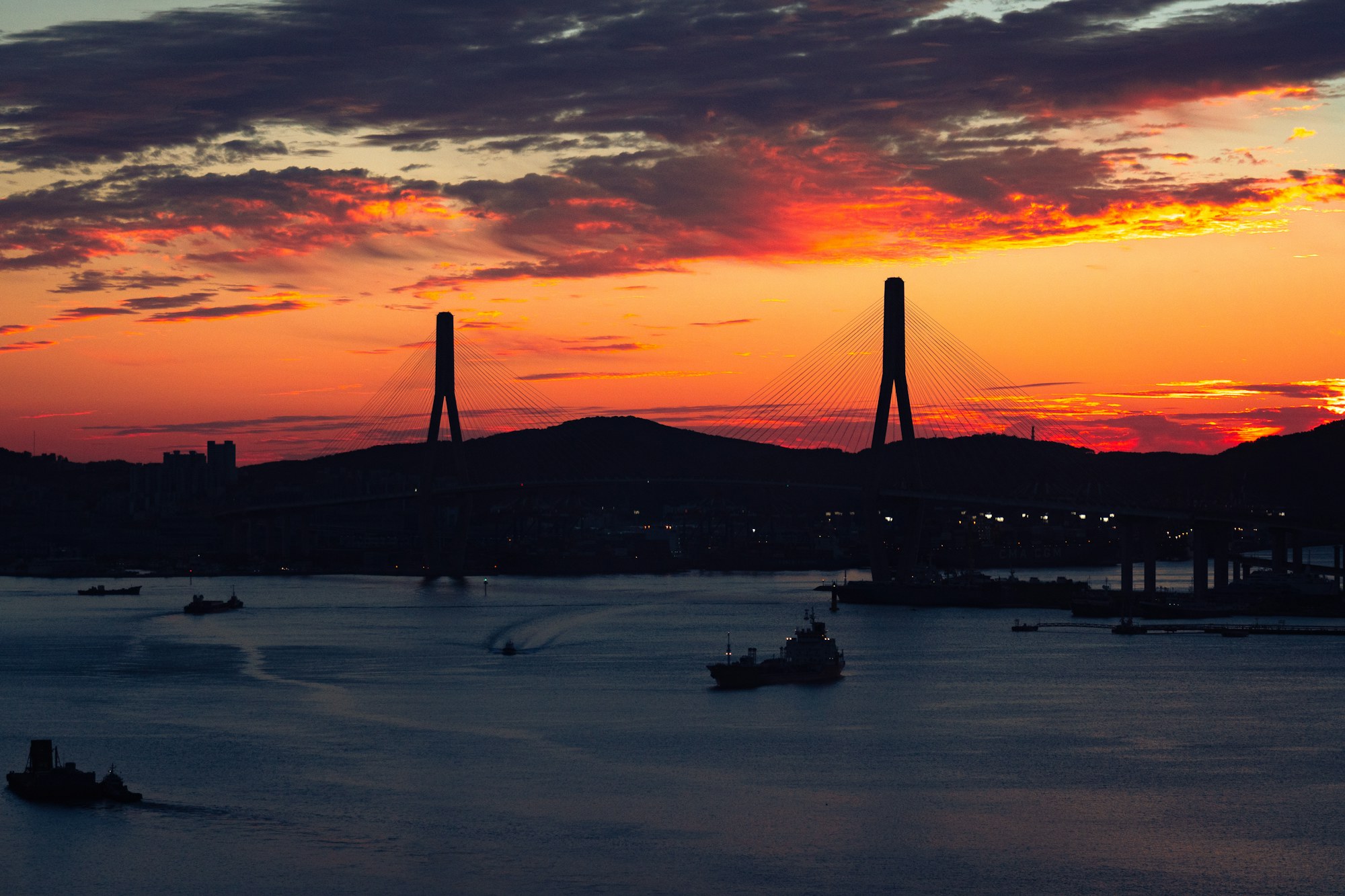 Bridge and harbour in Busan at sunset